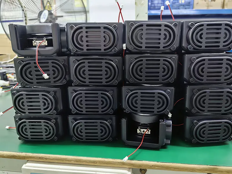 Rectangular speaker modules with grilles arranged on a ZEH workbench