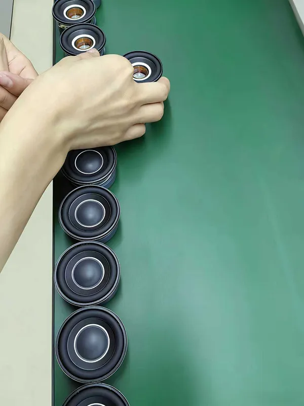 Speaker driver assembly on a production workbench